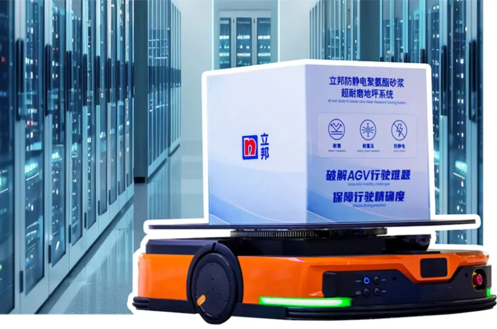 An automated guided vehicle transporting a Nippon Paint box across industrial flooring.
